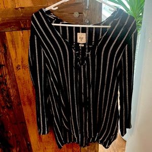 Billibong size Small long sleeved light weight with hoodie.  Never been worn.